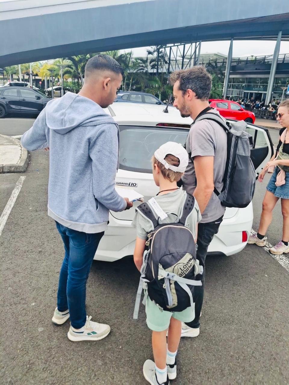 Tourists picking up car in Mauritius