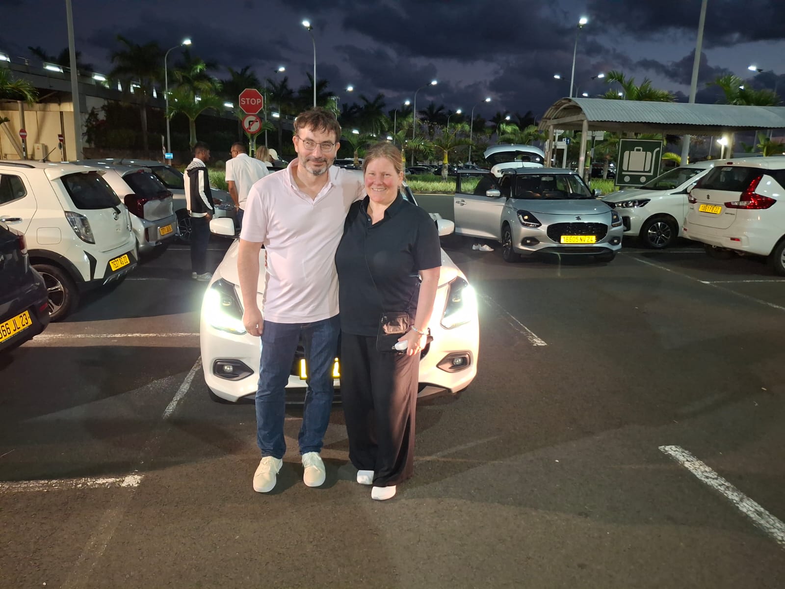 Tourist picking up rental car